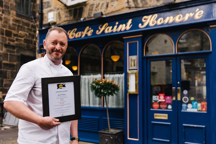 Neil Forbes, Chef Director, with his Organic Served Here 3-star award