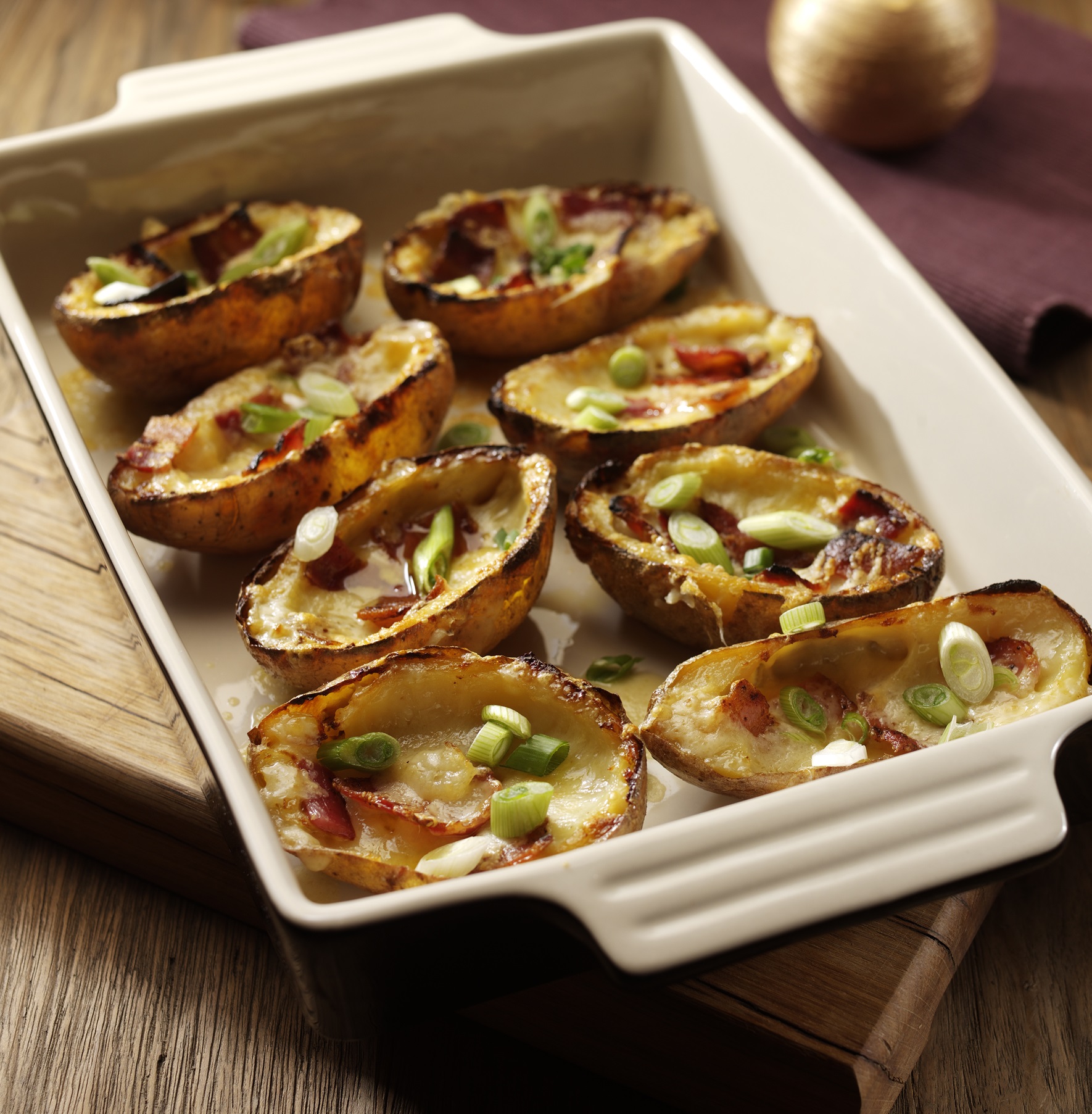 Baked potato skins with melted Godminster cheddar and bacon